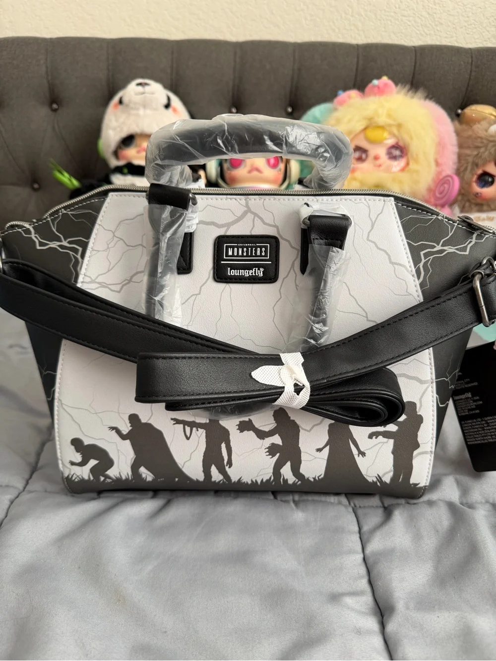 Loungefly Classic Monsters Satchel Bag - White & black. Comes with strap.